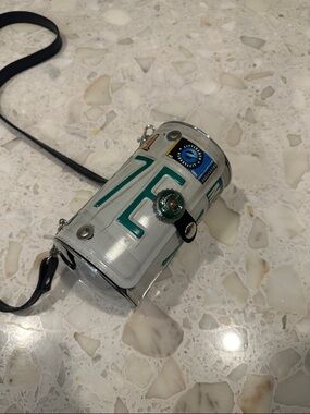 Little Earth White and Teal Cylinder Florida license plate Crossbody Bag